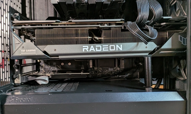 The GT 710 installed. The 1030 that replaced it isn't much bigger and also doesn't need a power cable from the PSU, which saved me from having to rewire my GPU power setup.